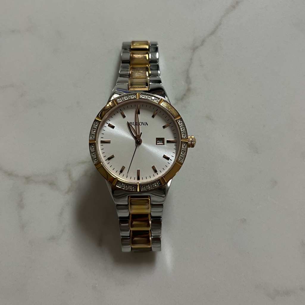 Bulova Silver And Gold Watch With White Dial